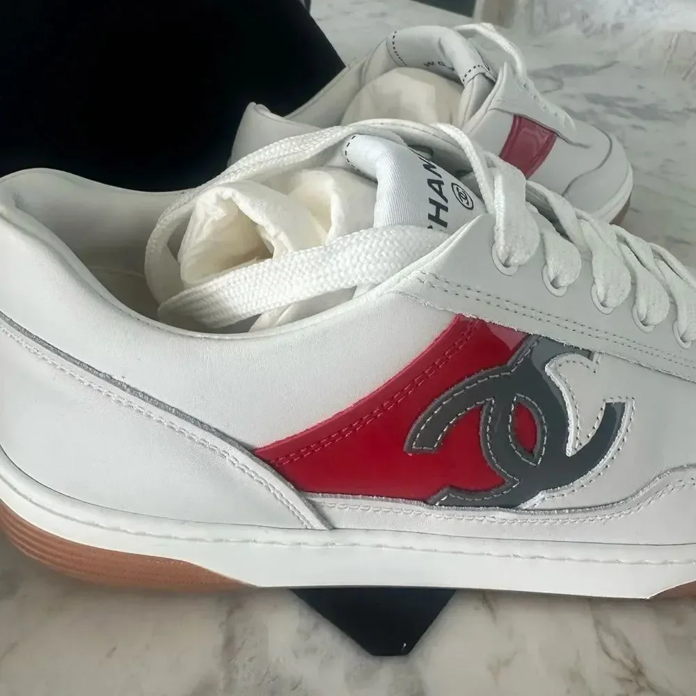 Chanel Woman’s White Sneakers with red and grey CC logo